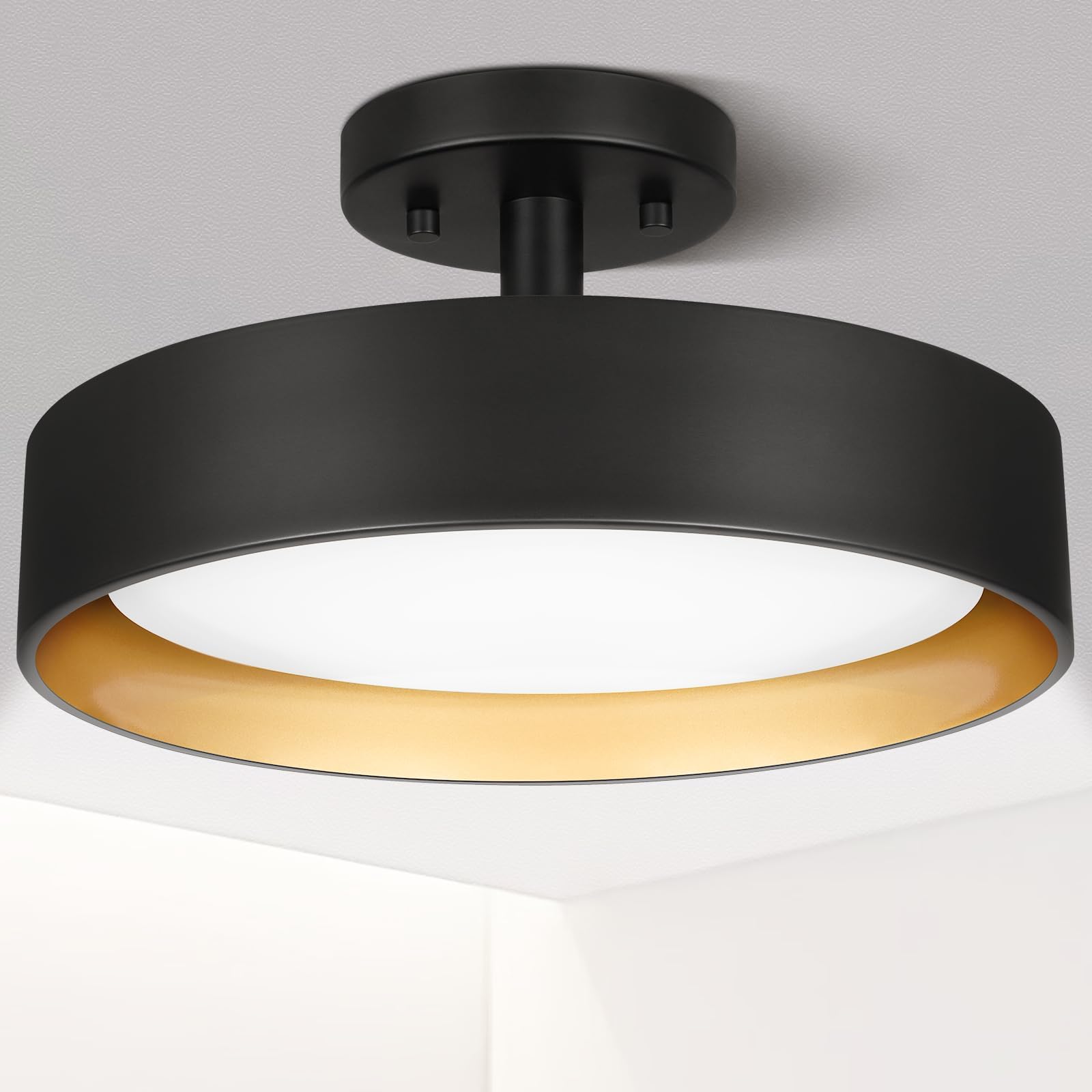 SunRider semi-flush mount with black exterior and gold interior adds vintage-modern elegance to hallways