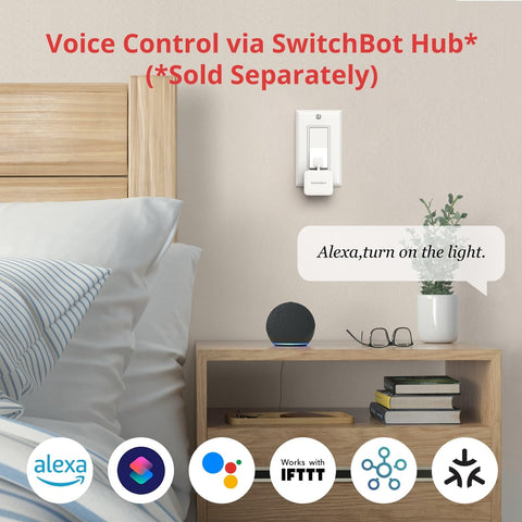SwitchBot Fingerbot mounted beside a bedside lamp for reliable operation.