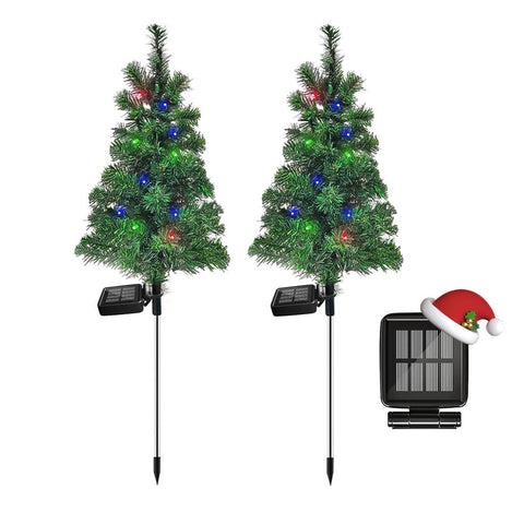SXXSMYWR solar Christmas tree stake with four-color LEDs illuminating outdoor pathways without wires.
