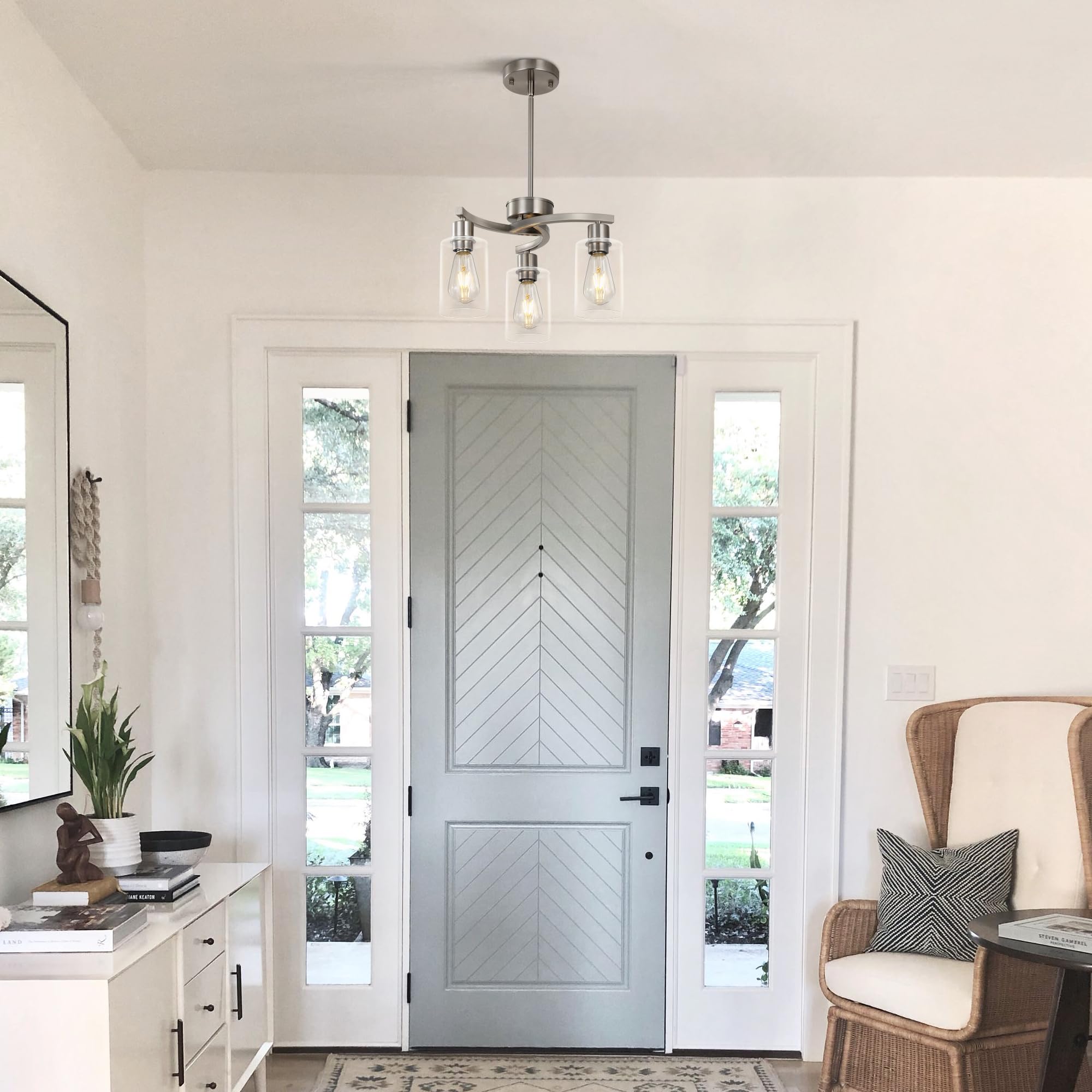 Syltherra 3-Light adjustable-height pendant over a table.
