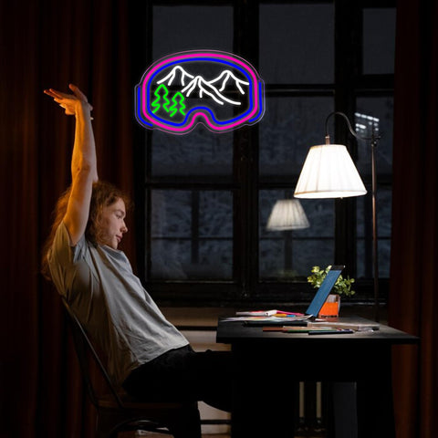 Symone ski goggles neon sign dimmed brightness creates cozy ambiance in a room