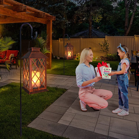TAKE ME flameless LED candle lantern provides warm white glow on patio.