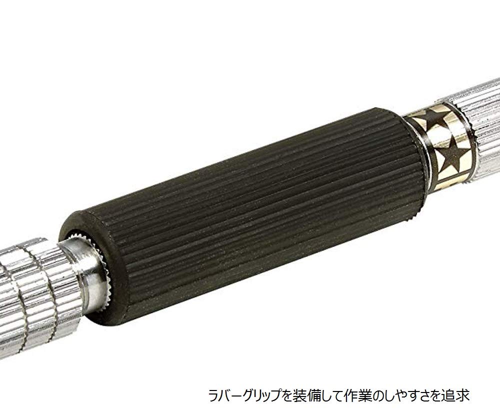 TAMIYA Fine Pin Vise in hand for steady control.