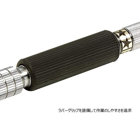 TAMIYA Fine Pin Vise in hand for steady control.
