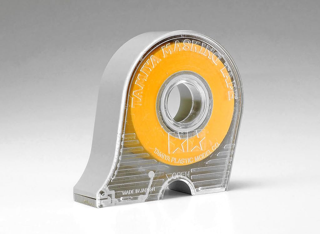 TAMIYA masking tape 10mm dispenser in use for clean paint separation.