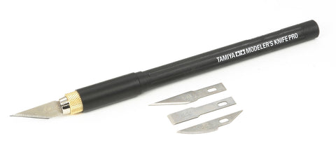 TAMIYA Modeler's Knife Pro showing elastomer grip and metal chuck for secure blade handling.