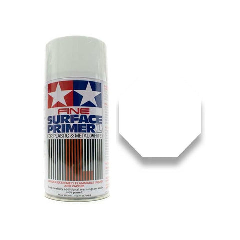 Tamiya primer spray nozzle close-up shows fine particle mist for even coverage.