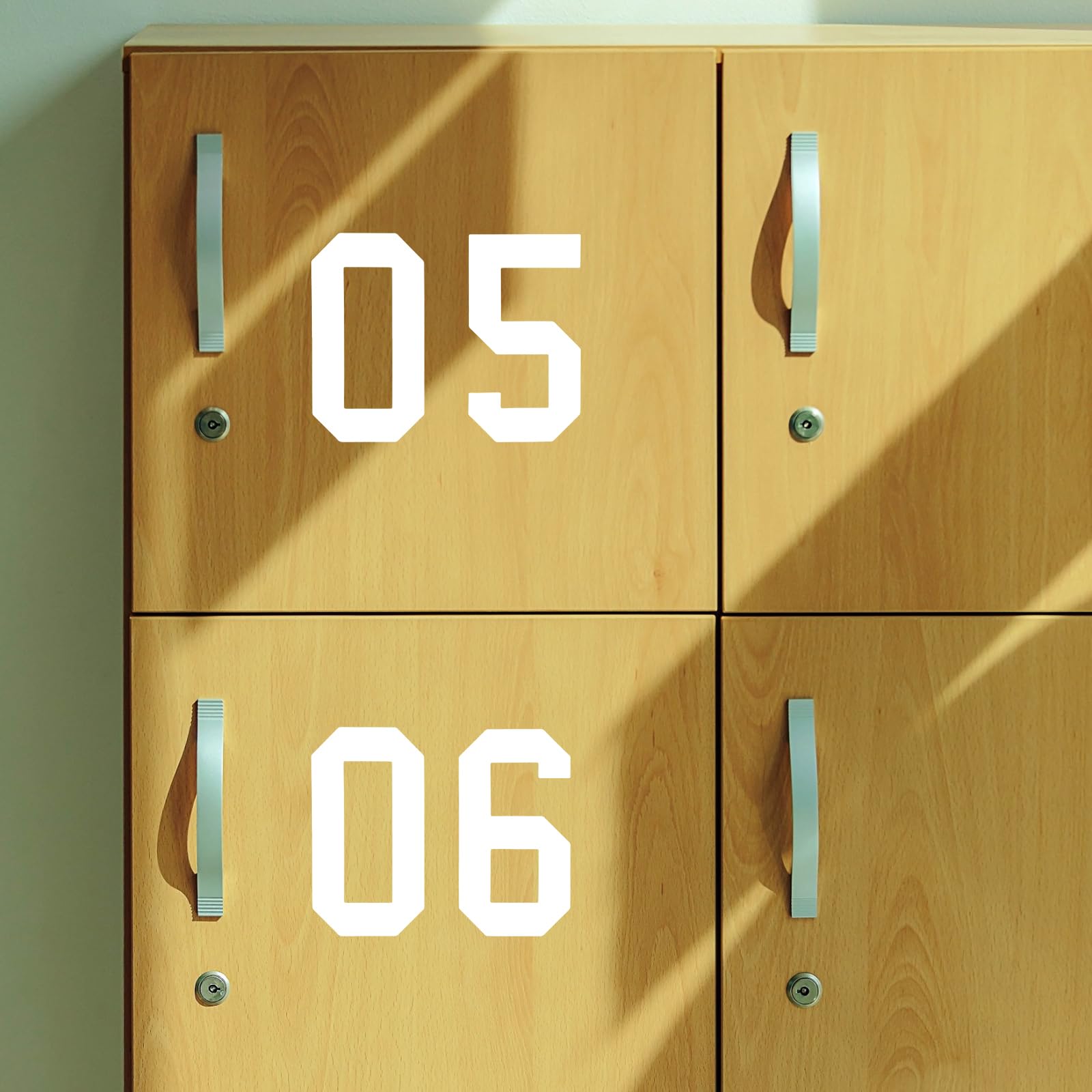 Weatherproof white numbers endure indoor and outdoor use