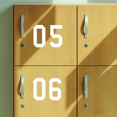 Weatherproof white numbers endure indoor and outdoor use