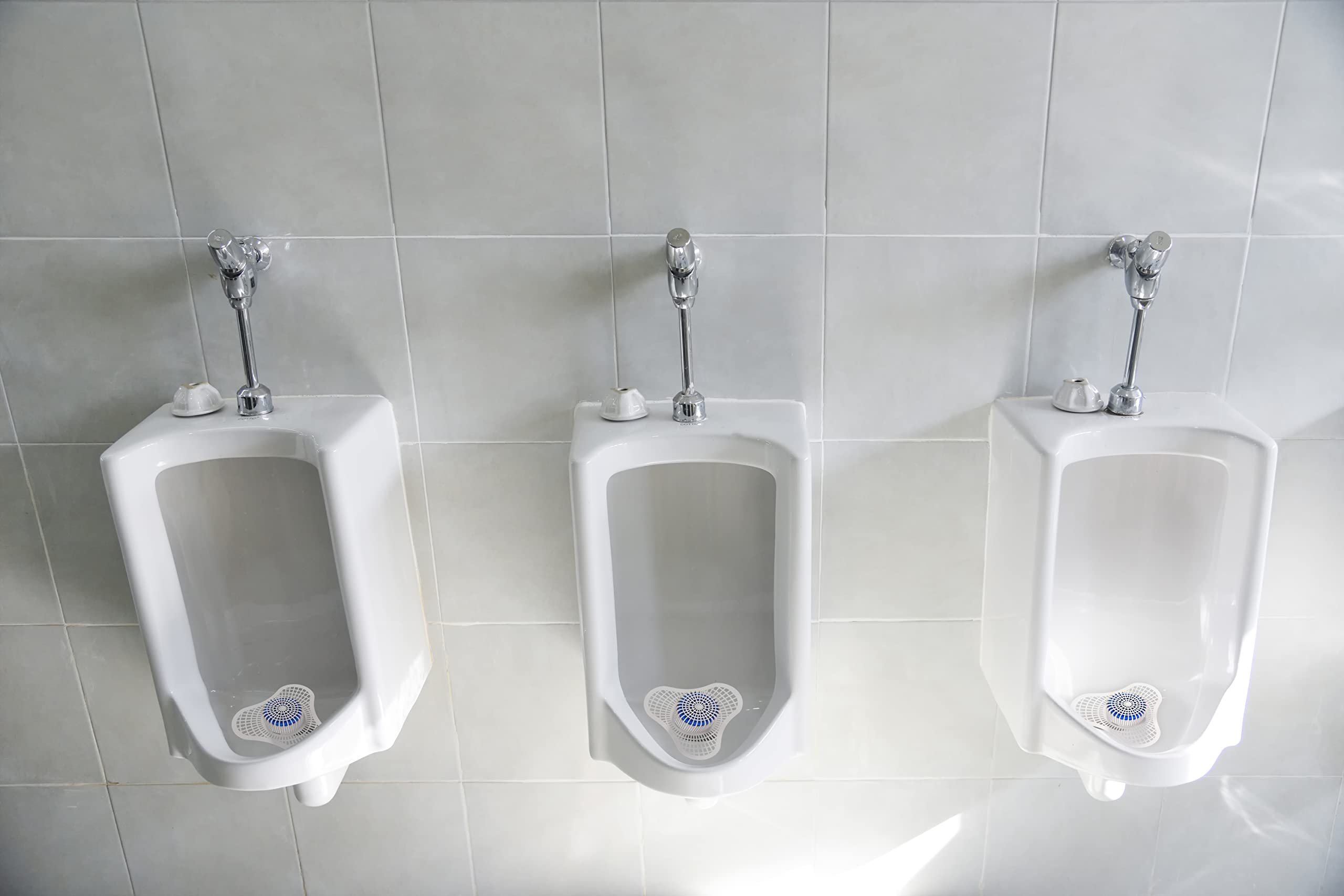 Tapix Urinal Screen Fragrance Release delivers ocean scent between flushes.