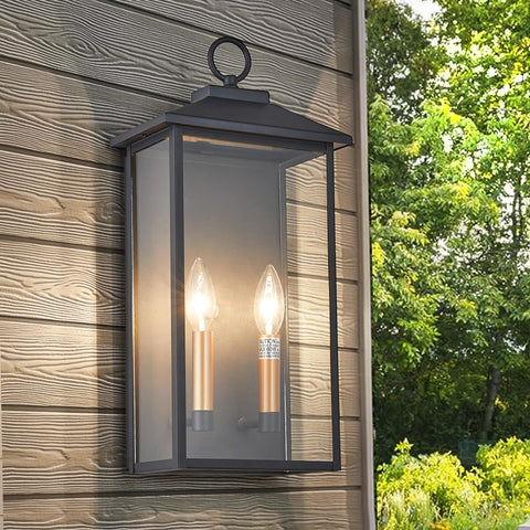 Tarentlight outdoor sconce with dual candle caps brightens doorways.