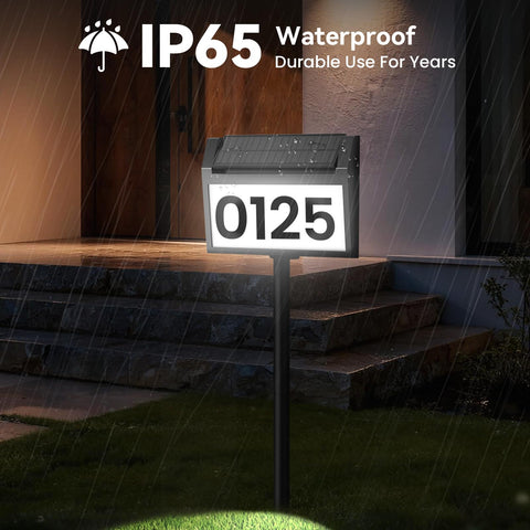 TECKNET solar address sign wall mount demonstrates easy outdoor placement.