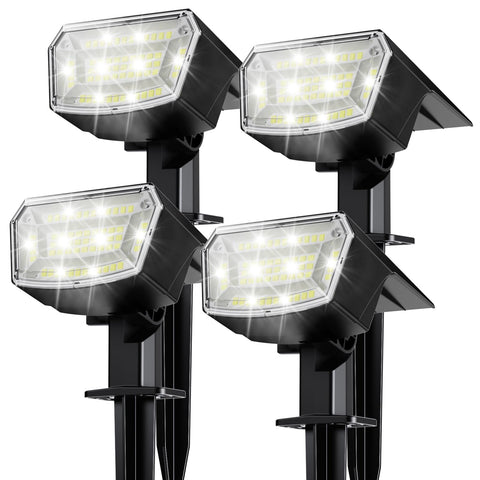 TECKNET outdoor 59 LED spot lights illuminate pathways with even brightness.