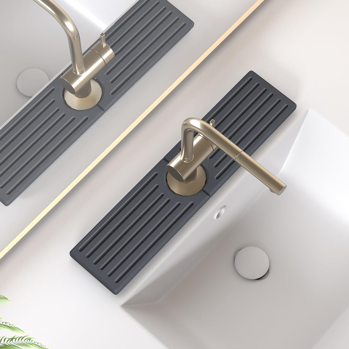 Telomet Stone Faucet Mat on kitchen sink catching spills around faucet.
