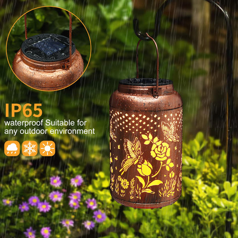 Tepaken Rose Butterfly lantern on the ground guides paths with soft glow.