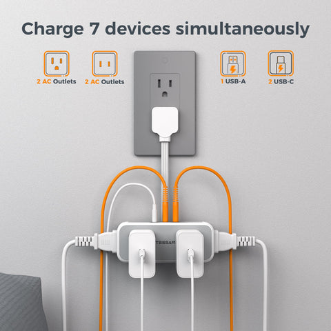 TESSAN flat-plug power strip on a desk saves space and reduces cable clutter.