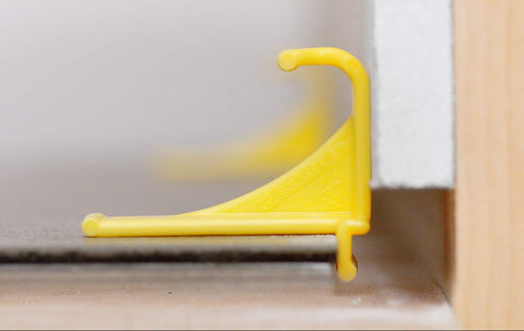 TFloor spacers prevent slips during setup with non-slip action.
