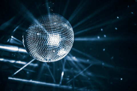 The Dreidel Company Mirror Disco Ball 2-inch hanging provides compact sparkle for tables.