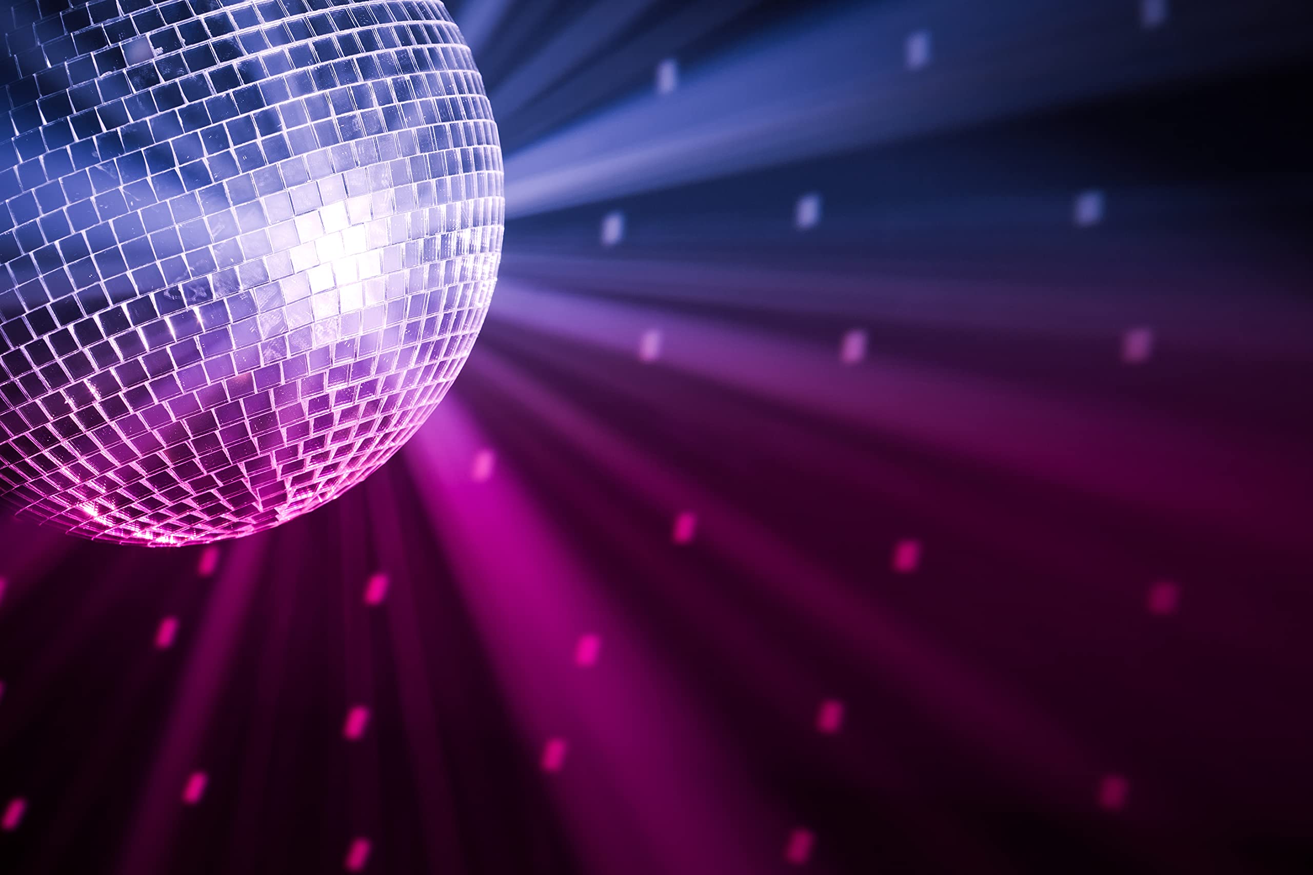 The Dreidel Company Mirror Disco Ball 5-inch hanging scatters light across rooms.