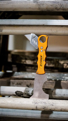 Zorr 2-Edge Knife in use shows compact two-in-one design.