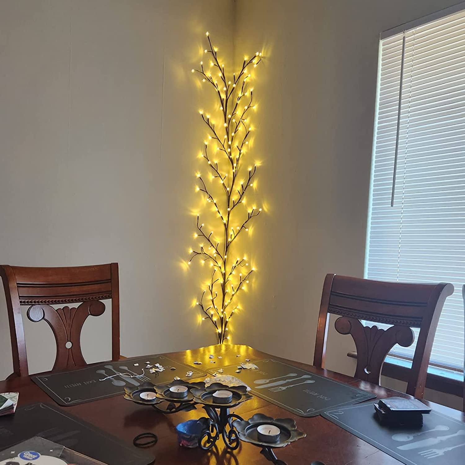 The Light Garden lighted willow vine nighttime coziness creates warm evenings.