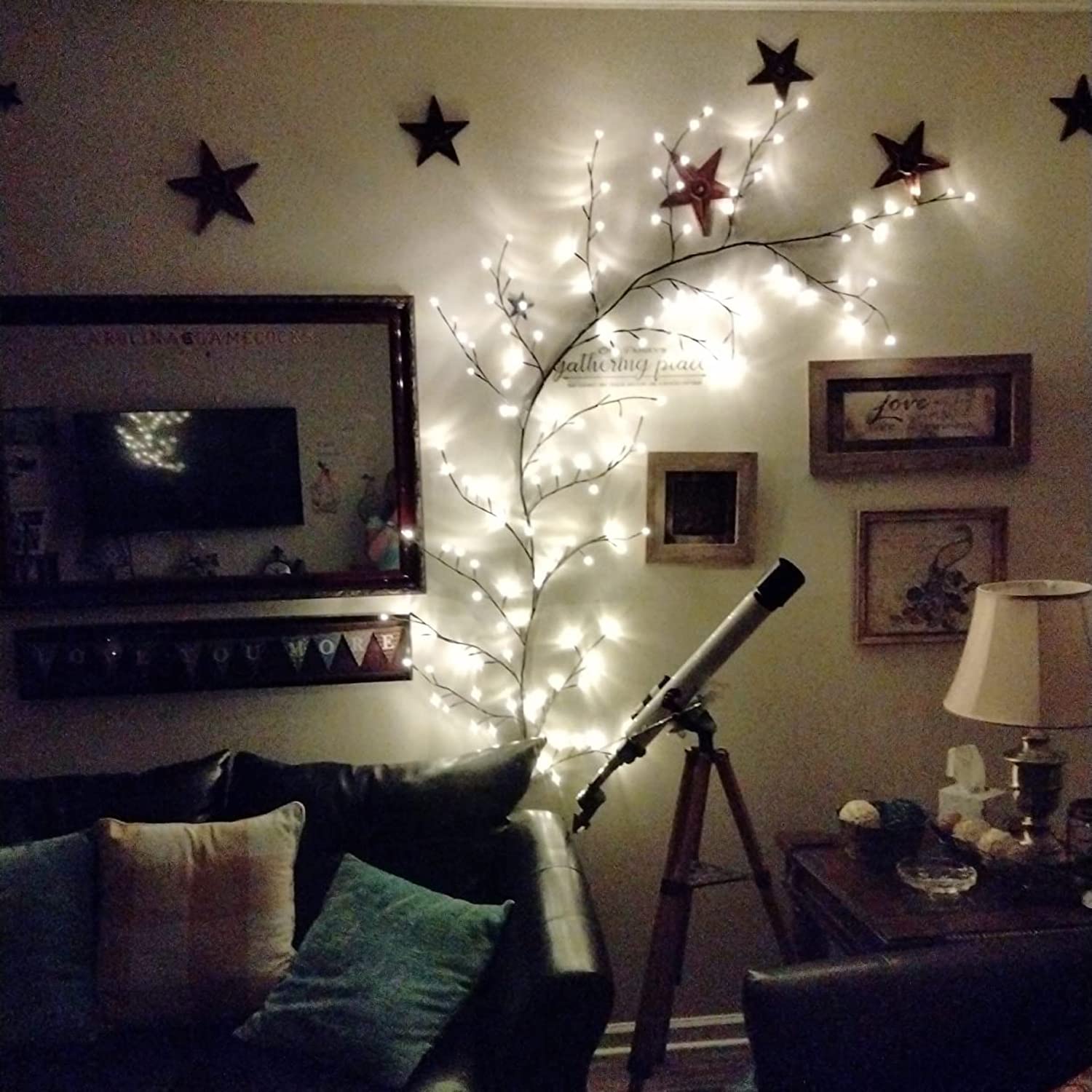 The Light Garden lighted willow vine stair rail glow guides foot traffic with cozy light.
