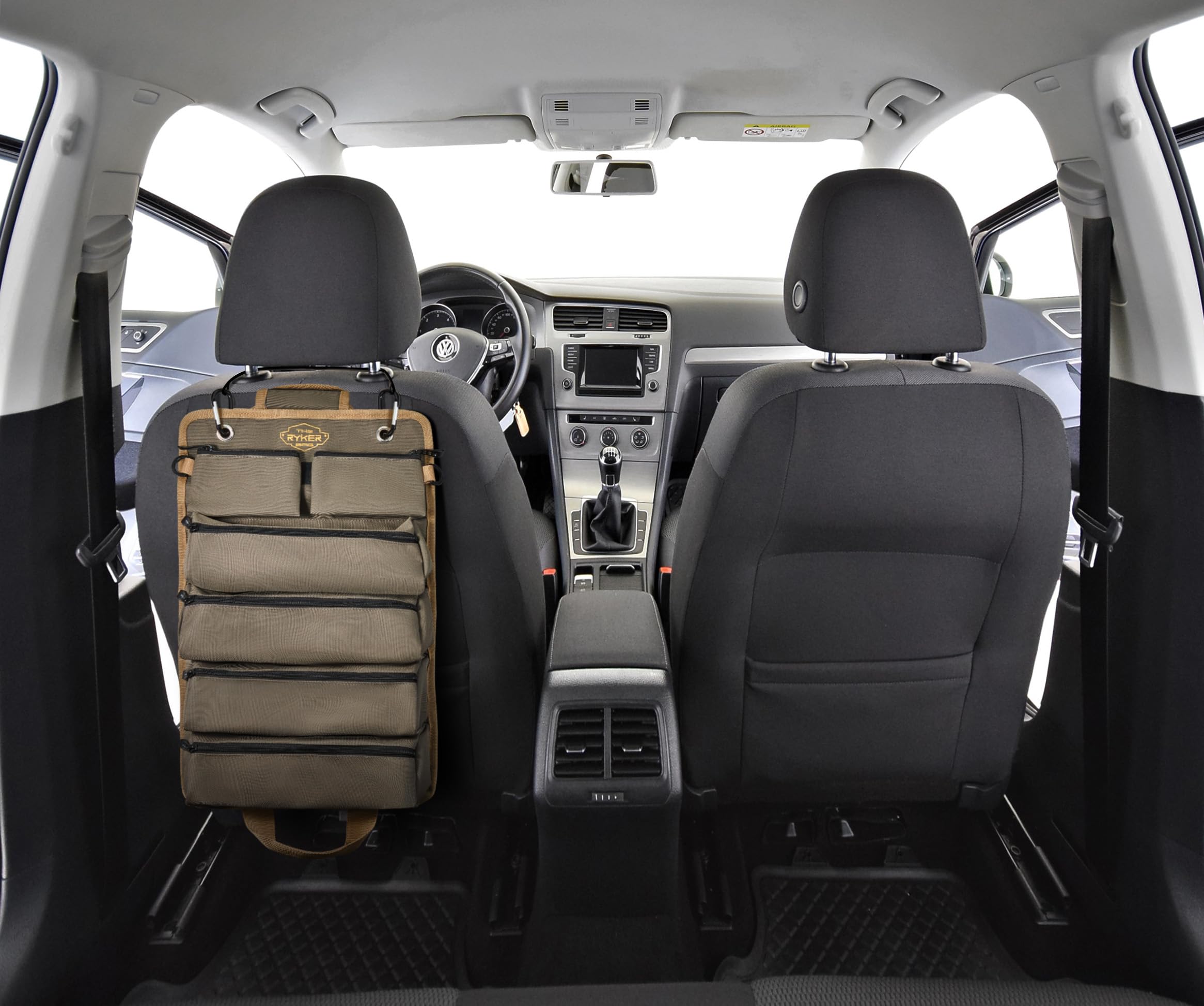 The Ryker Bag in a truck shows on-the-go tool transport.