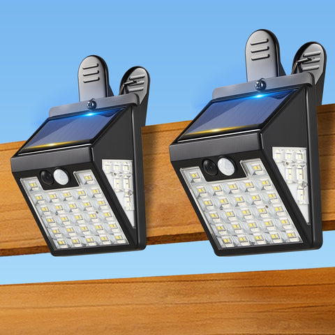 Thumok clip-on solar lights mounted on a fence showing bright, secure outdoor evenings