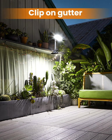 Thumok clip-on solar light on gutter, rain-ready waterproof design.