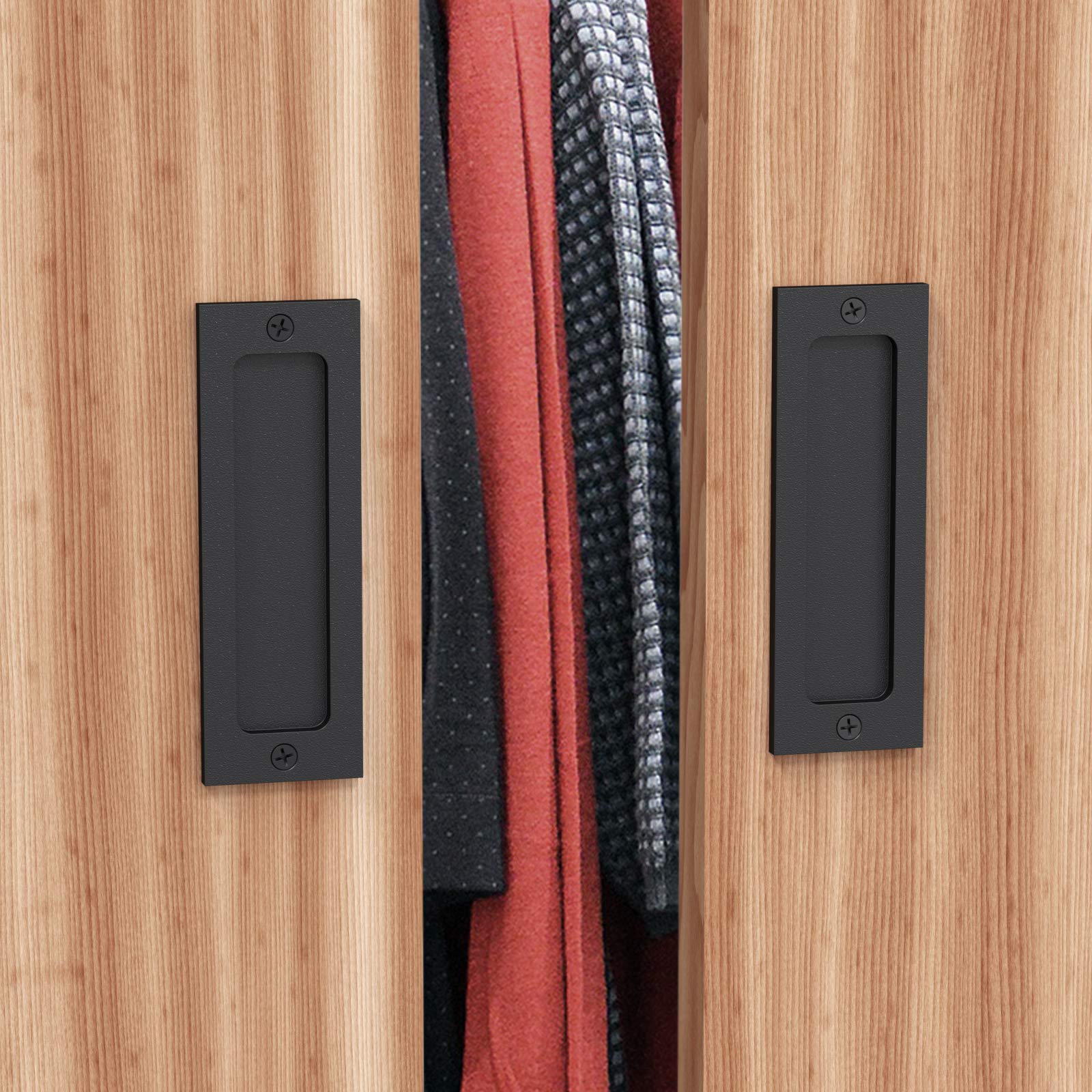 Tibres barn door pulls in matte black with rustic-modern vibe.