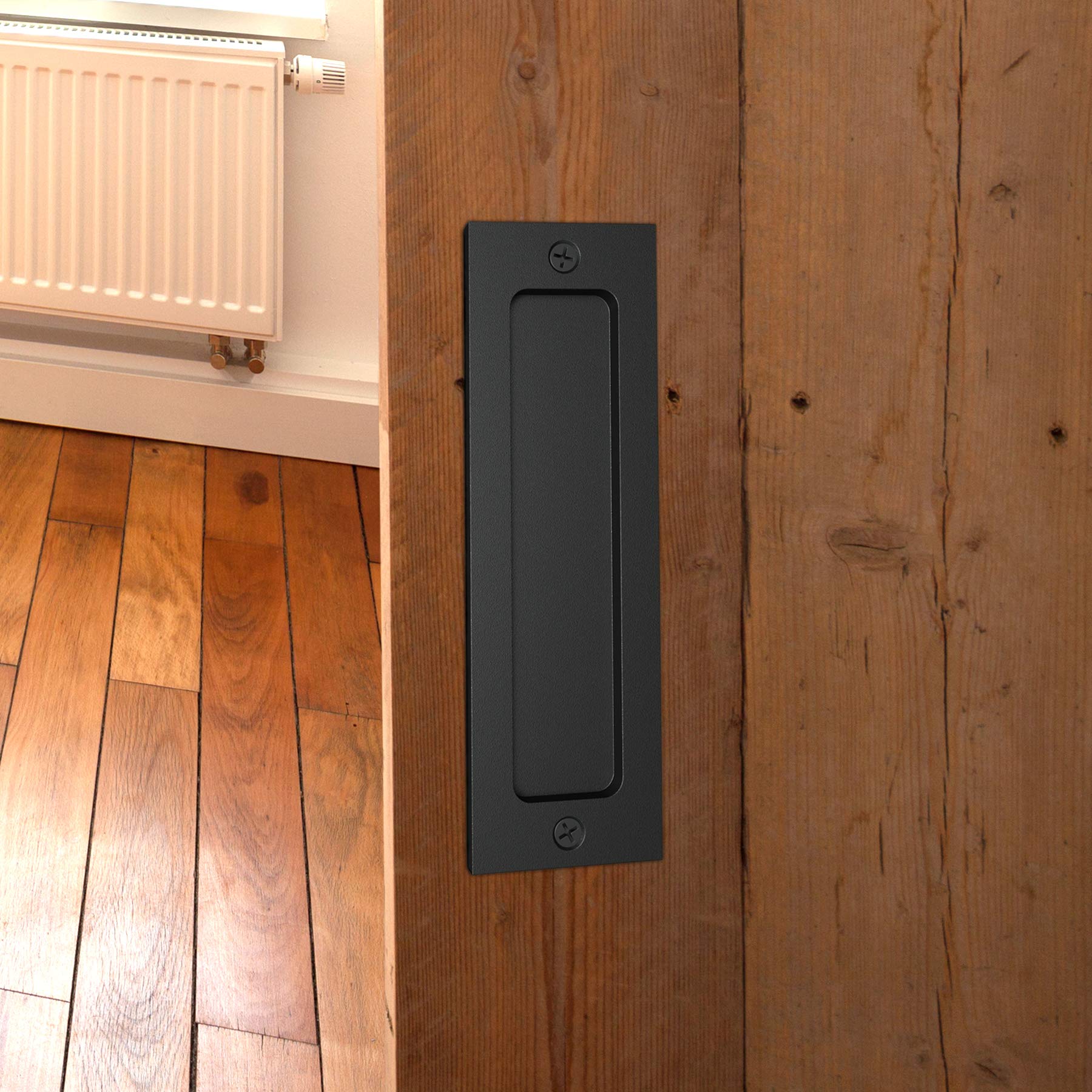 Tibres black finish handle adds industrial flair to doors
