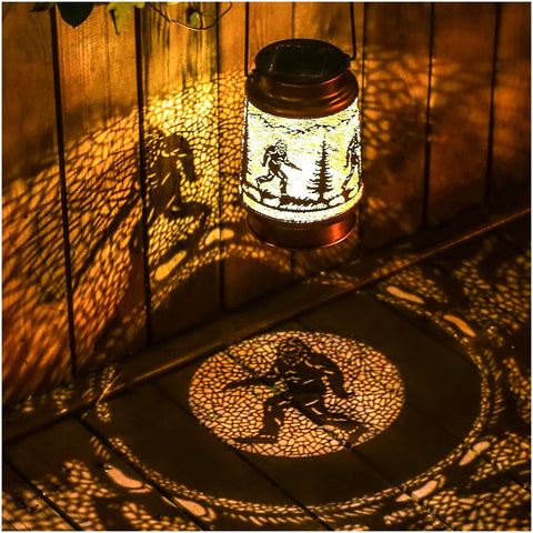 TIGGSY Bigfoot solar lantern hanging for welcoming outdoor ambience.