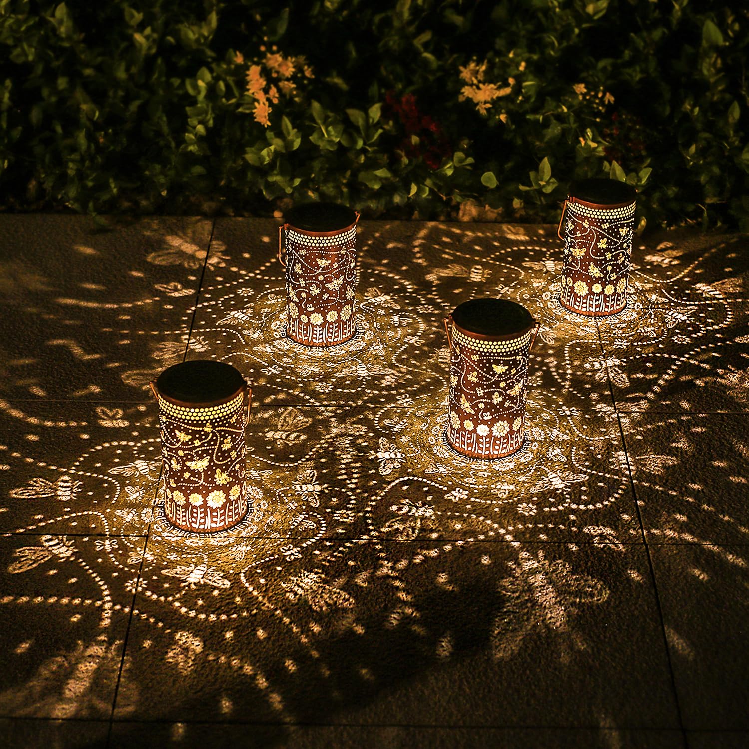 TIGGSY garden path bee lantern guides guests along walkways.