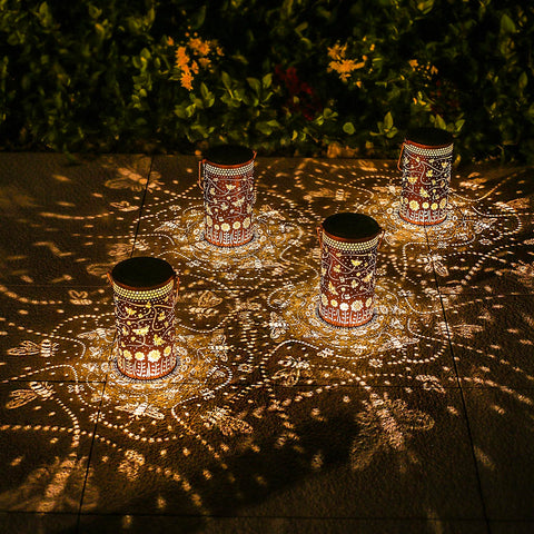 TIGGSY garden path bee lantern guides guests along walkways.