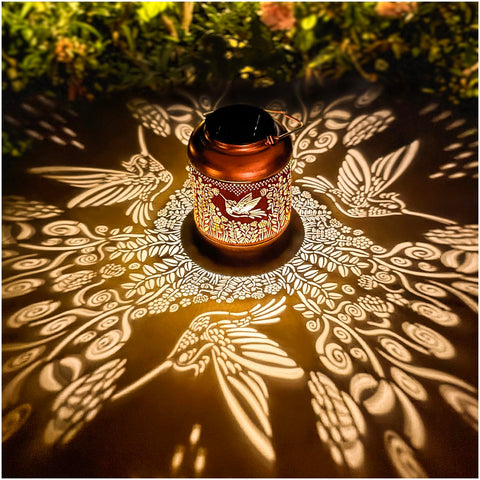 TIGGSY hummingbird solar lantern garden displays warm ambient light for evenings outdoors
