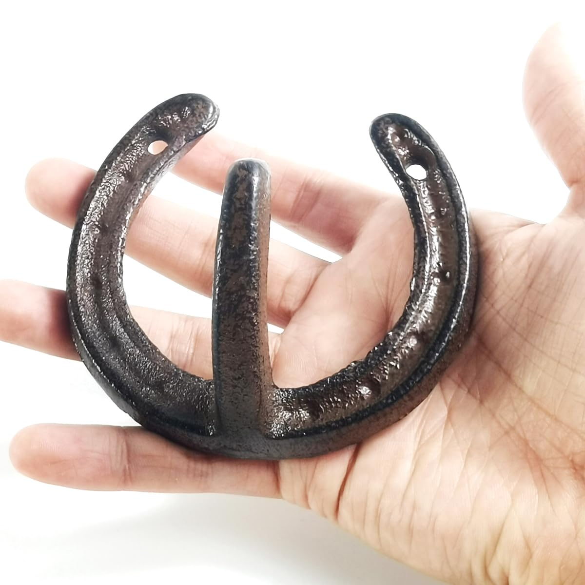 TIHOOD horseshoe hook shown outdoors, ready to organize coats, umbrellas, and garden tools.