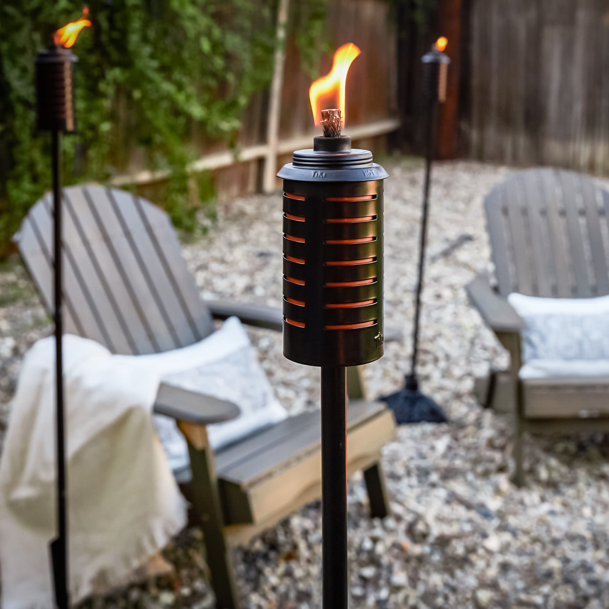 TIKI 65-inch full-size torch delivering bold illumination for patios and backyards