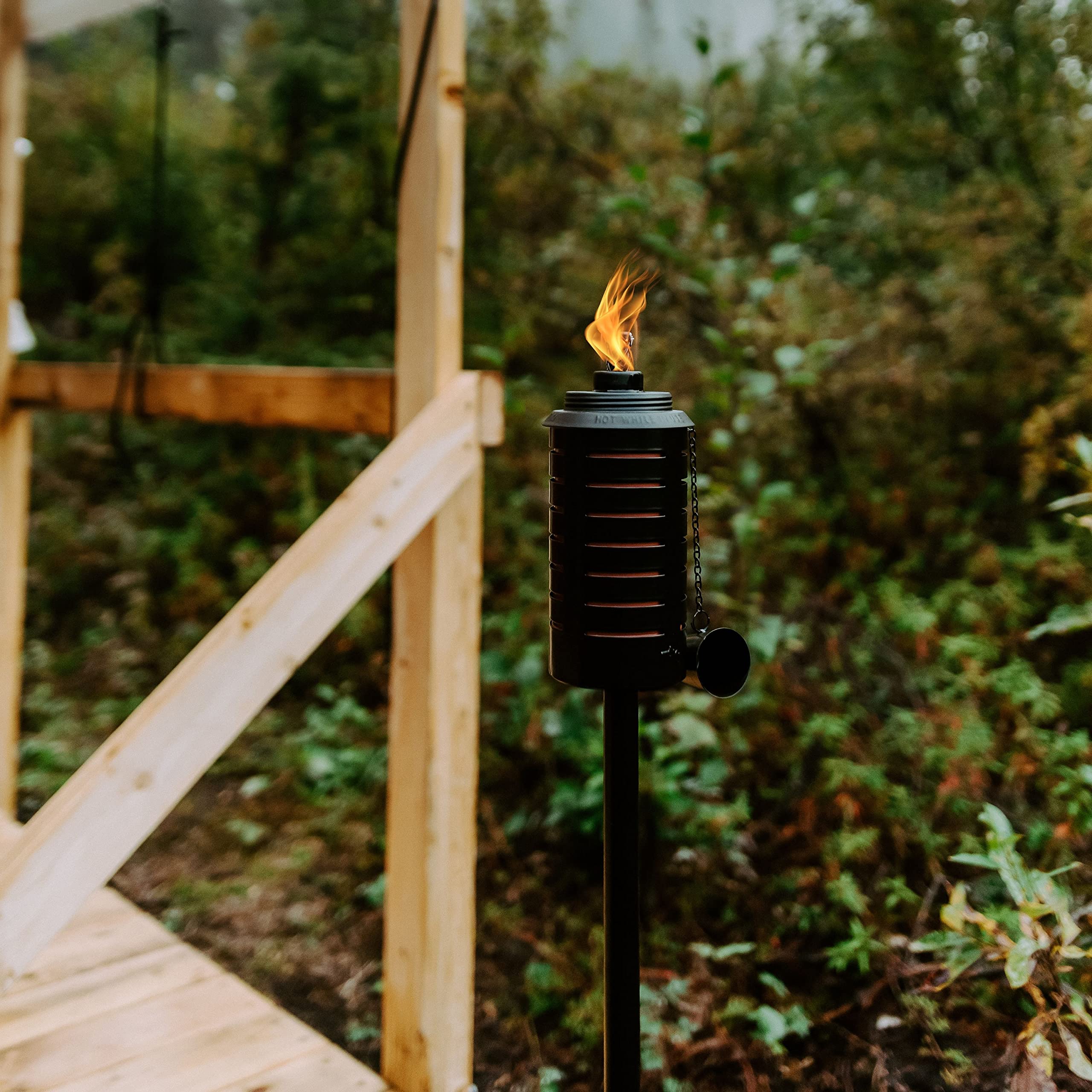 TIKI wind-resistant flameguard helps maintain flame in breezy evenings