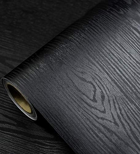 Tiltil Black Wood wallpaper close-up shows grain texture for a realistic look.