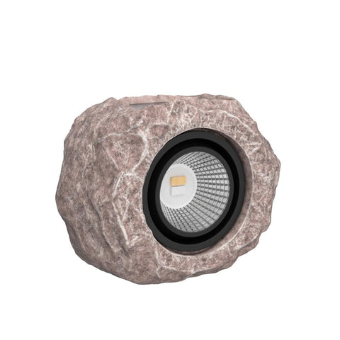Timeflies Solar Rock Light with IP65 waterproof design handling rain and wind outdoors.