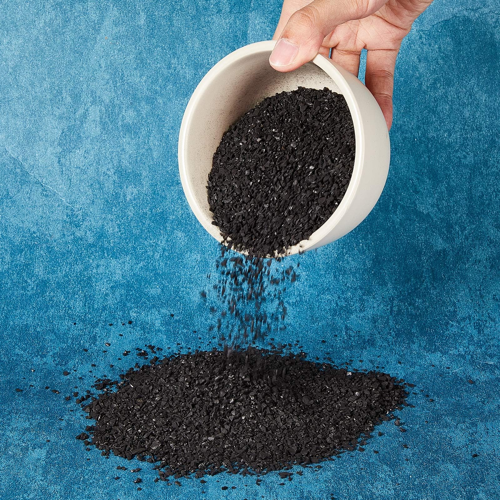 Timgle water filtration with coconut charcoal in a home setup.
