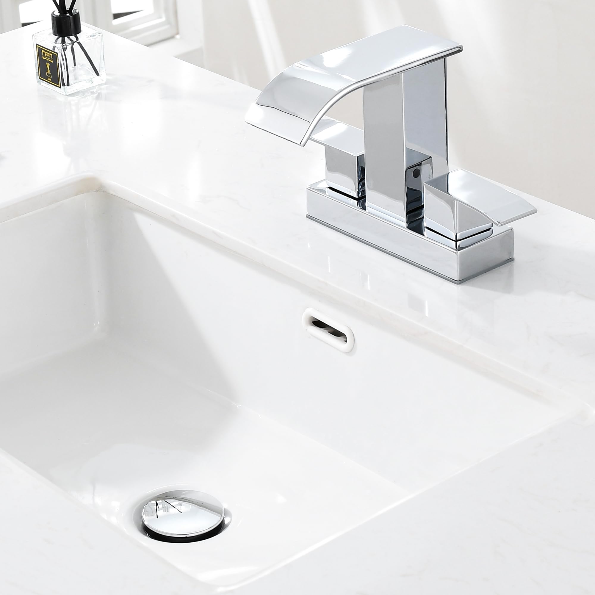 TIORIY chrome pop-up drain in use on a vessel sink