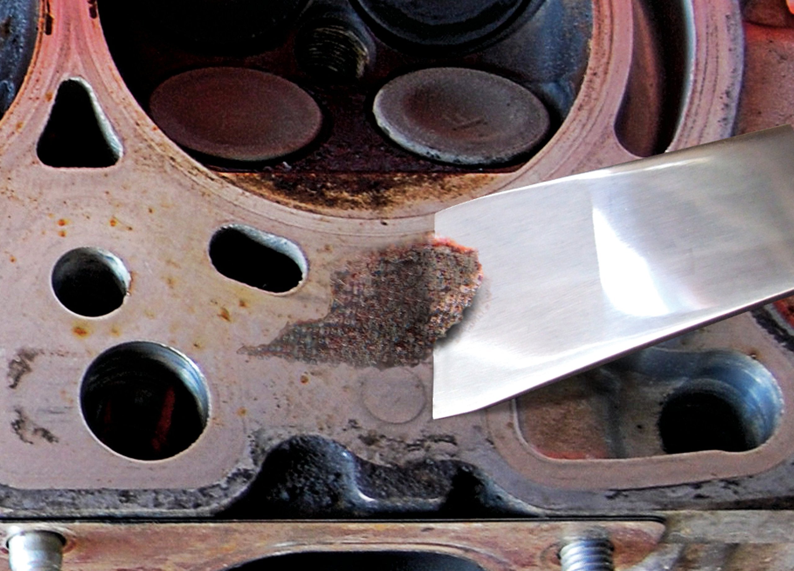 Titan 17009 razor-edge scraper for removing caulk and residue.