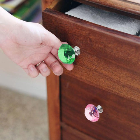 Tkocisa crystal dresser knobs catch light, giving surfaces a soft, elegant shine.