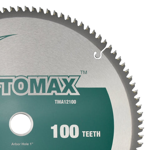TOMAX blade cutting plastic materials for precise trimming.
