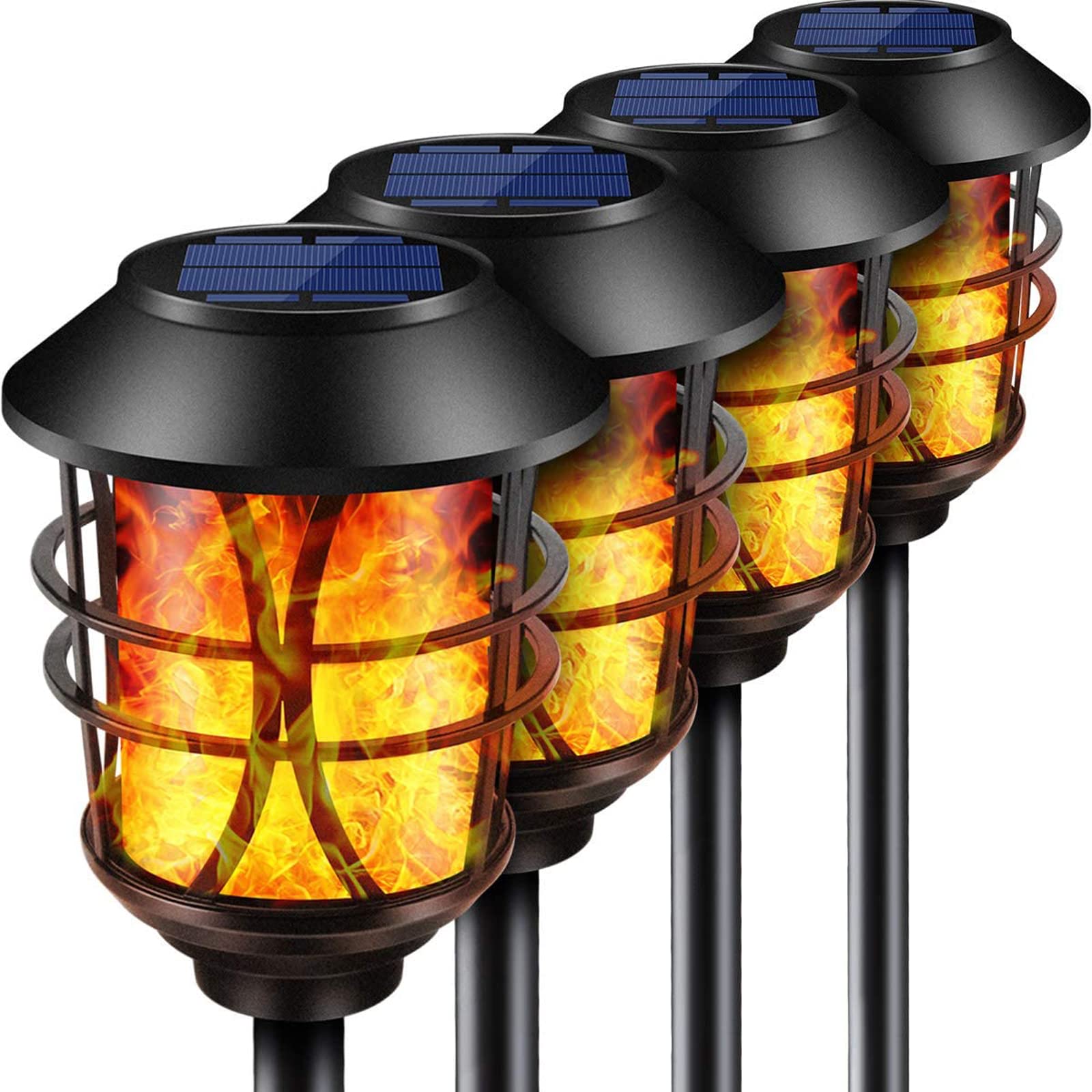 TomCare solar flame torch in the garden, creating inviting evening ambiance.