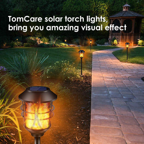 TomCare solar flame torch with stake installation for easy setup.
