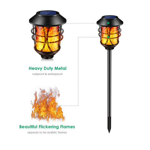 TomCare solar flame torch along the pathway adds warm, flickering light.