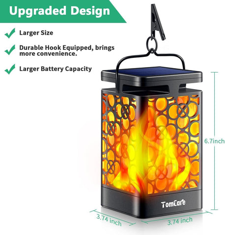 TomCare solar lantern on patio deck giving warm ambient light.