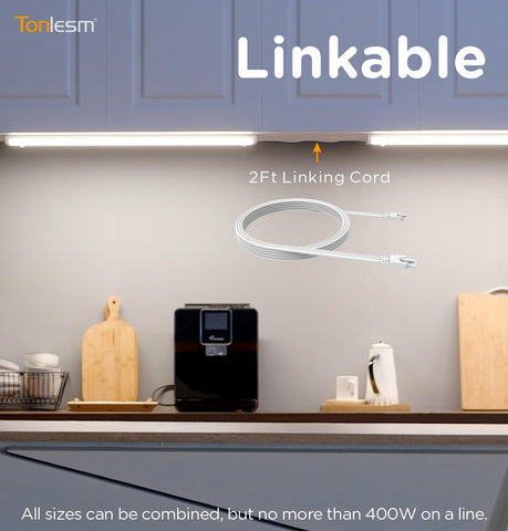 Tonlesm over-sink lighting provides focused task illumination for prep.